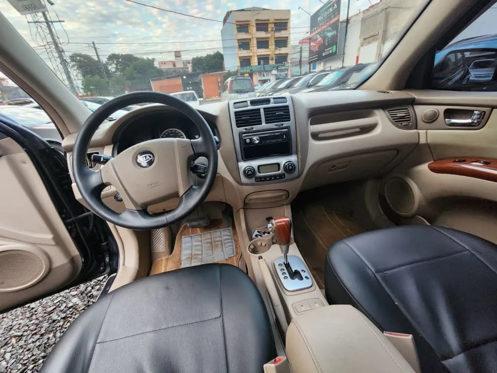 Kia Sportage — foto 3