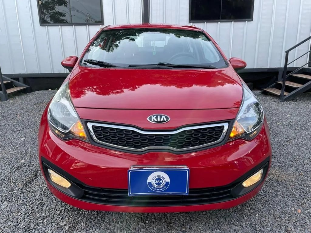 Kia Rio — foto 7