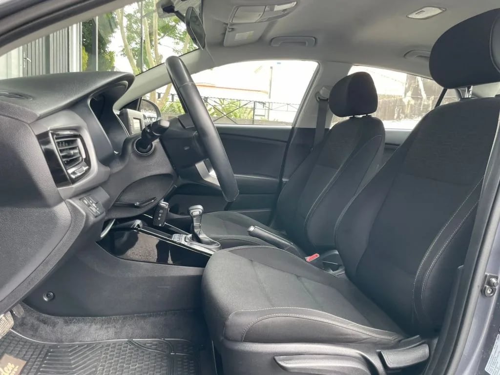 Kia Rio — foto 7