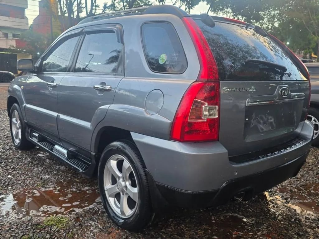 Kia Sportage — foto 7