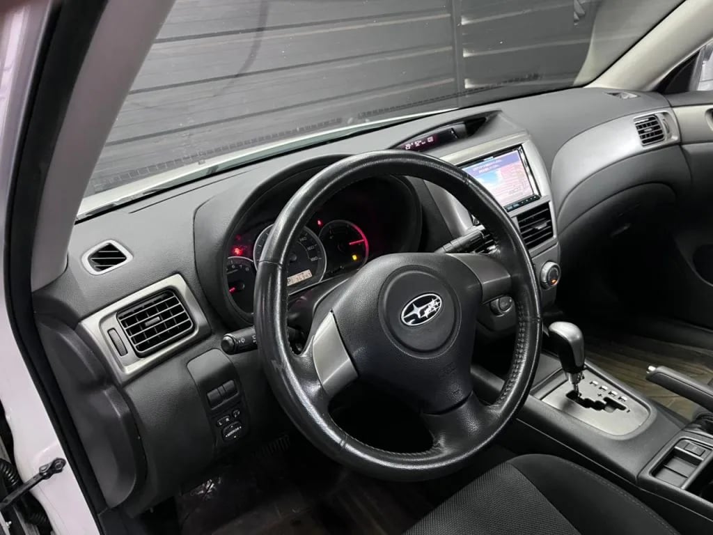 Subaru Impreza — foto 6