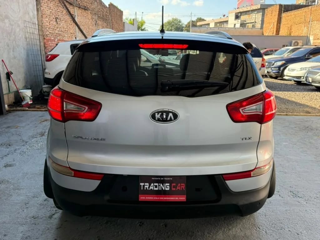 Kia Sportage — foto 9