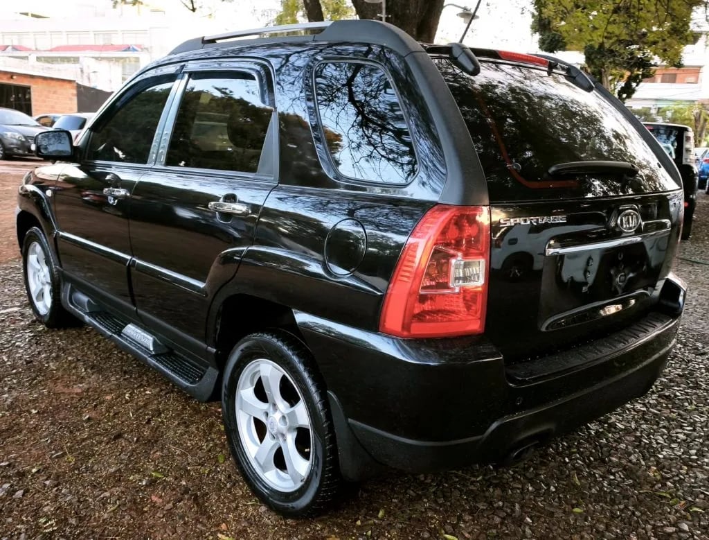 Kia Sportage — foto 7