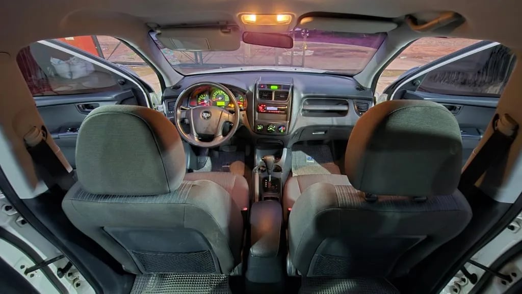 Kia Sportage — foto 9