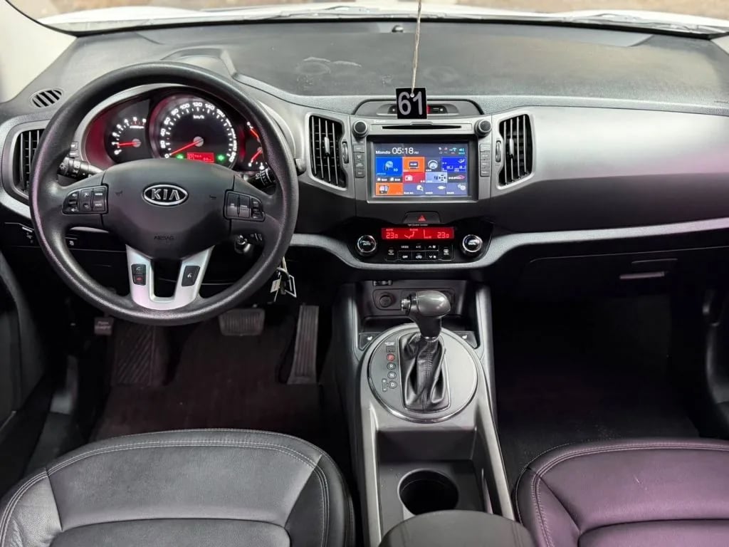 Kia Sportage — foto 6