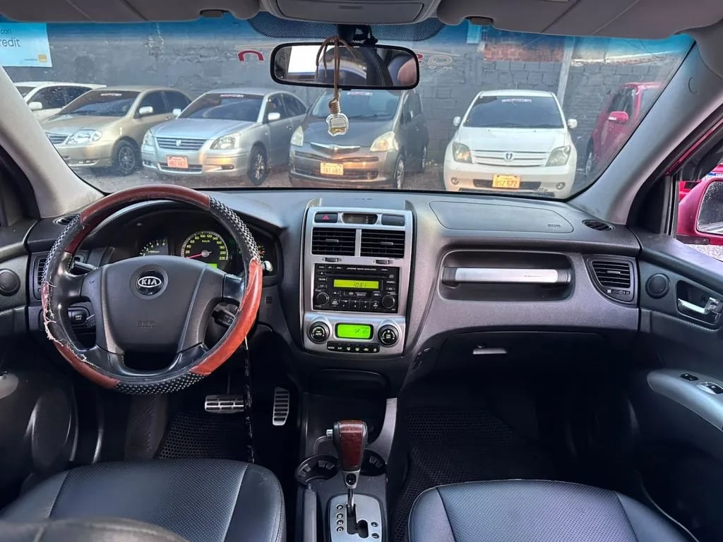 Kia Sportage — foto 9