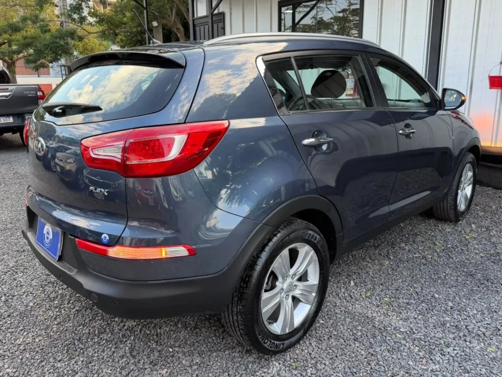 Kia Sportage — foto 7