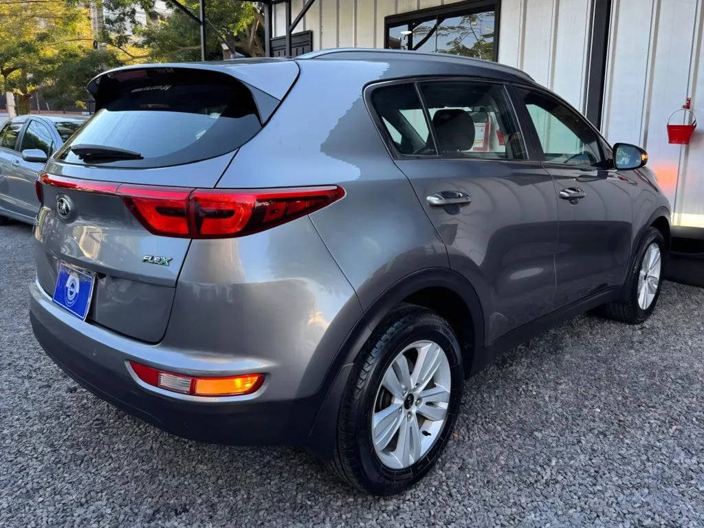 Kia Sportage — foto 7