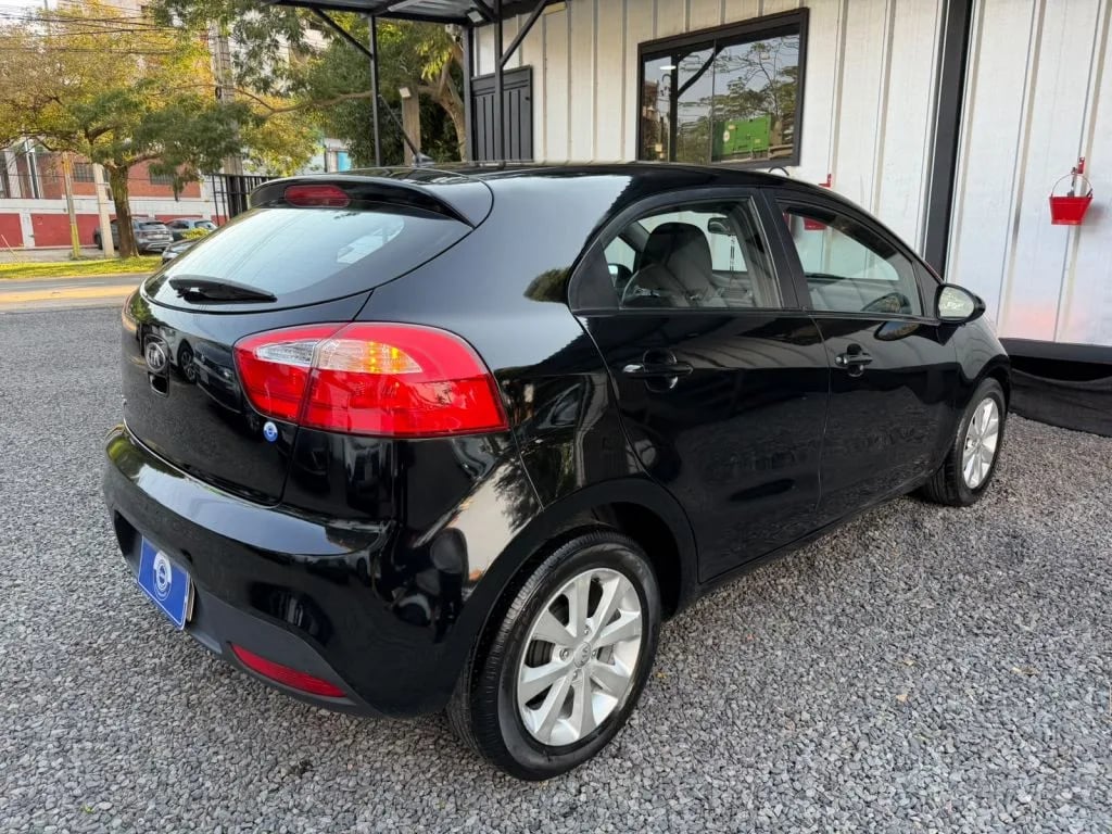 Kia Rio — foto 7