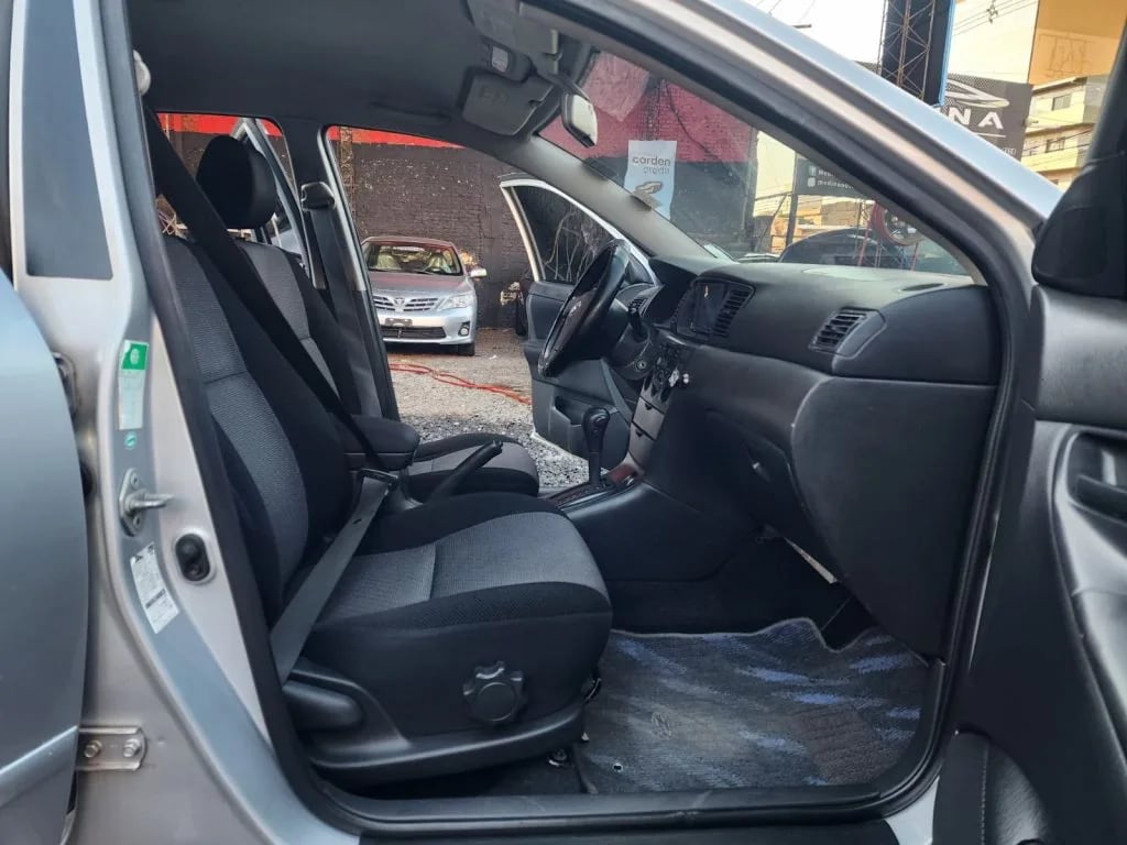 Toyota RunX — foto 8